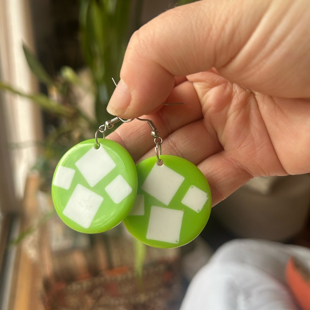 Green and White Geometric Earrings with Purple Pom Pom Earrings